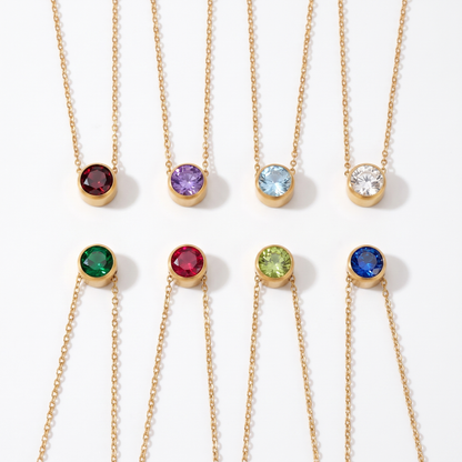 Birthstone necklace shown in eight stone colors