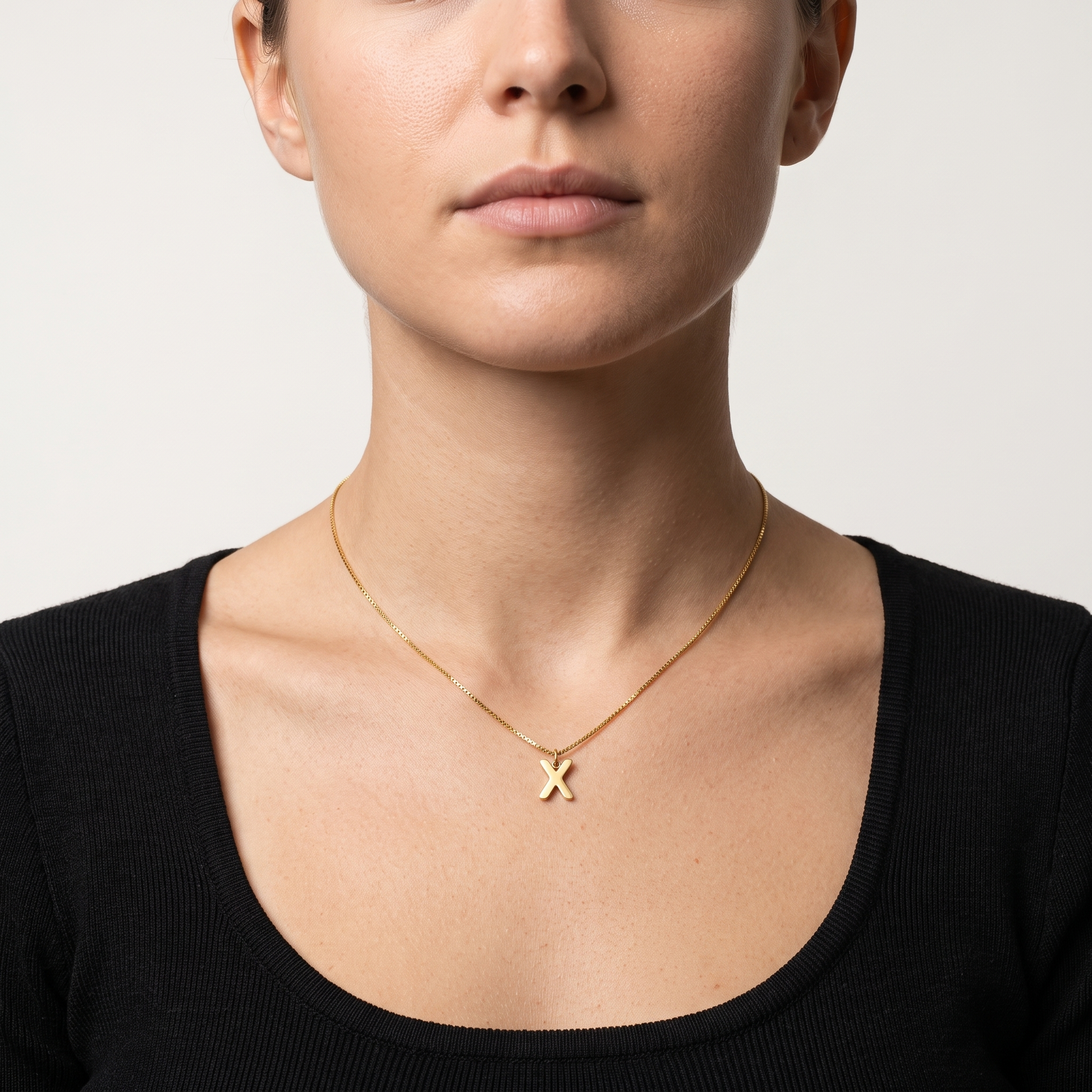 A-Z initial necklace worn, front view