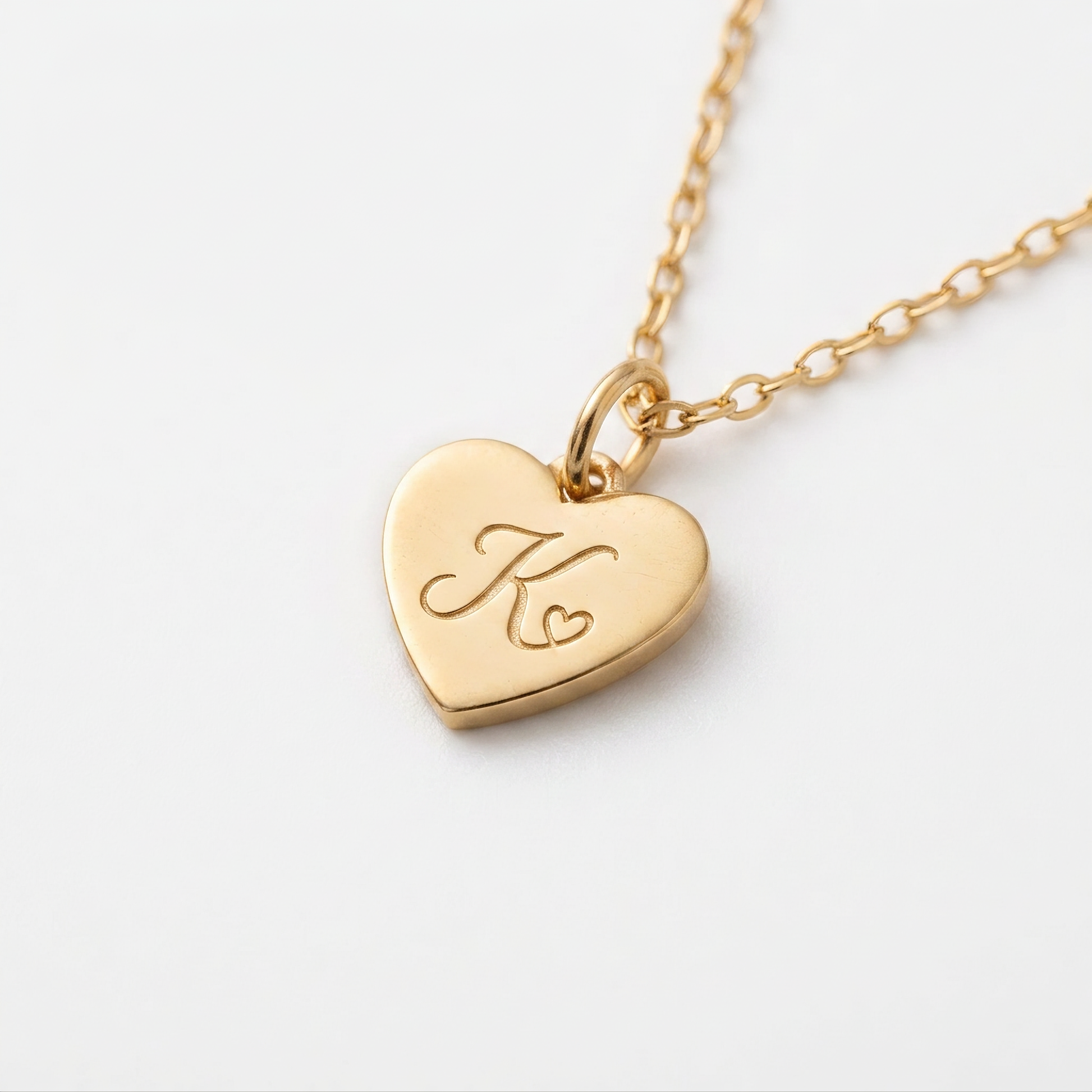Close-up of engraved initial on heart