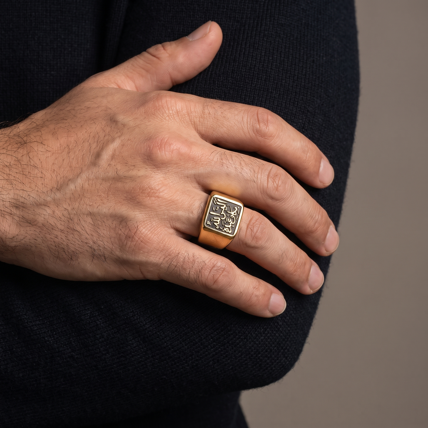 Arabic calligraphy signet ring worn, front view