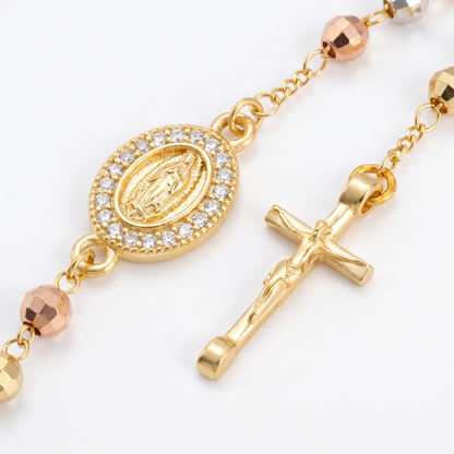 Close-up of medal and crucifix