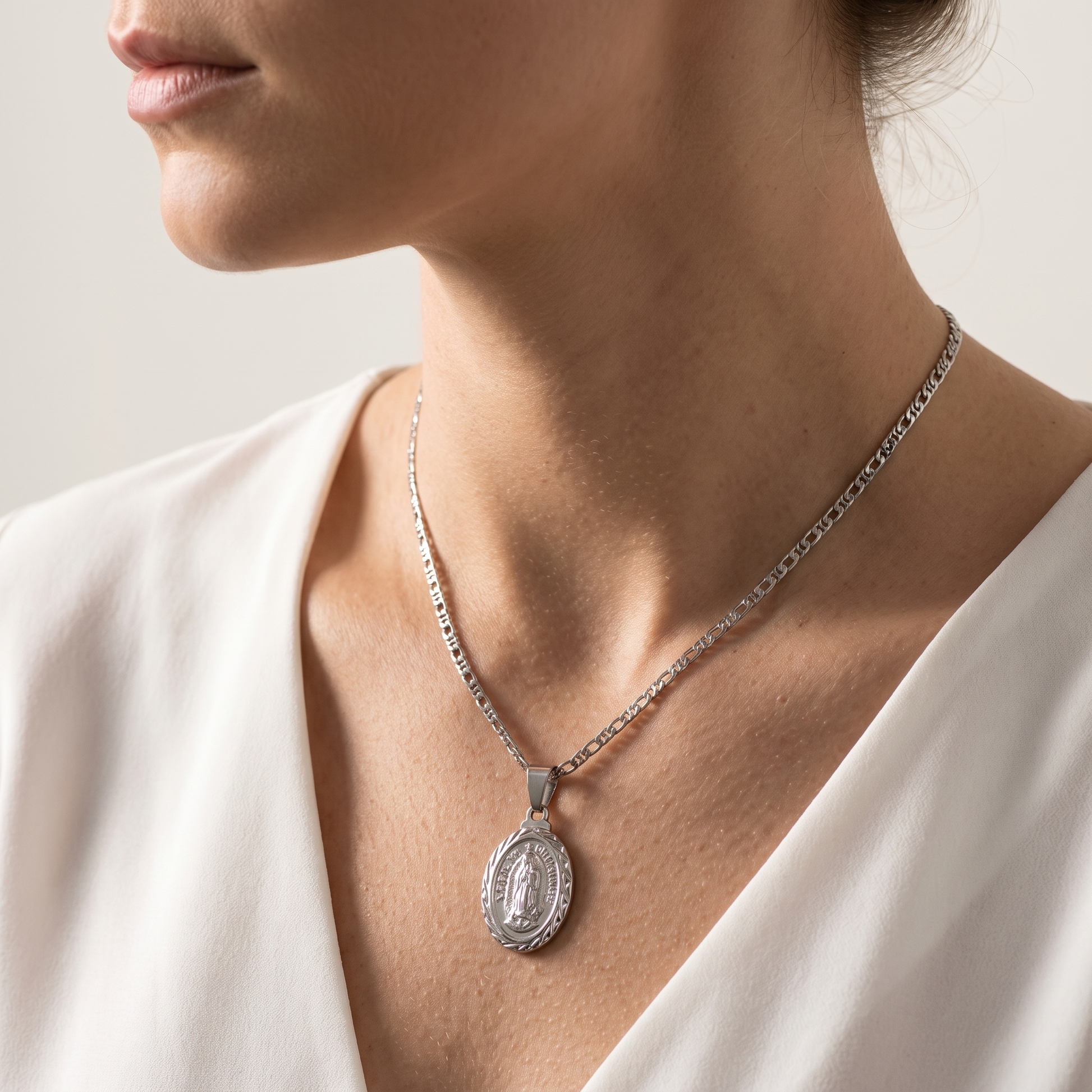 Virgin Mary statue pendant worn, second angle