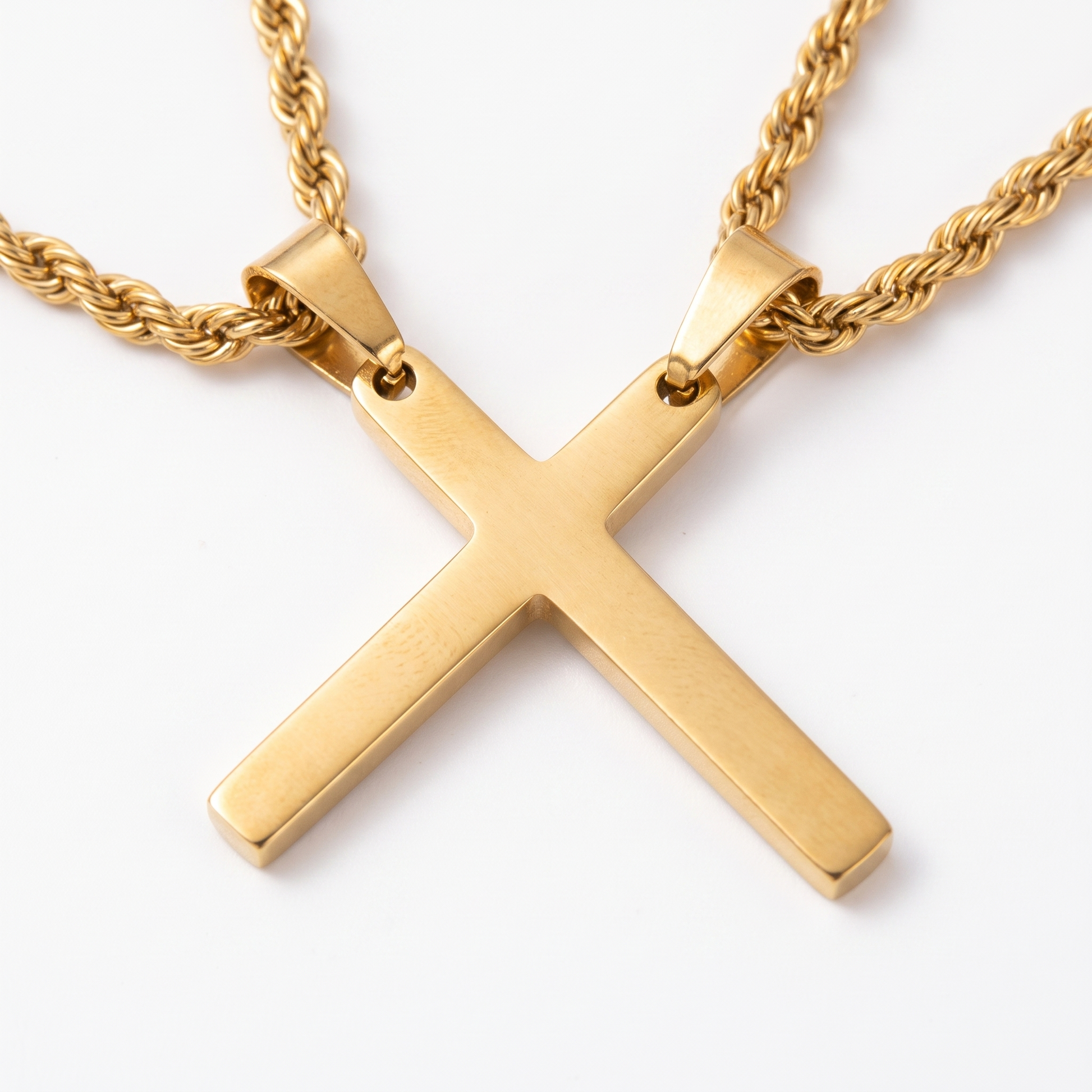 Close-up of small cross pendant