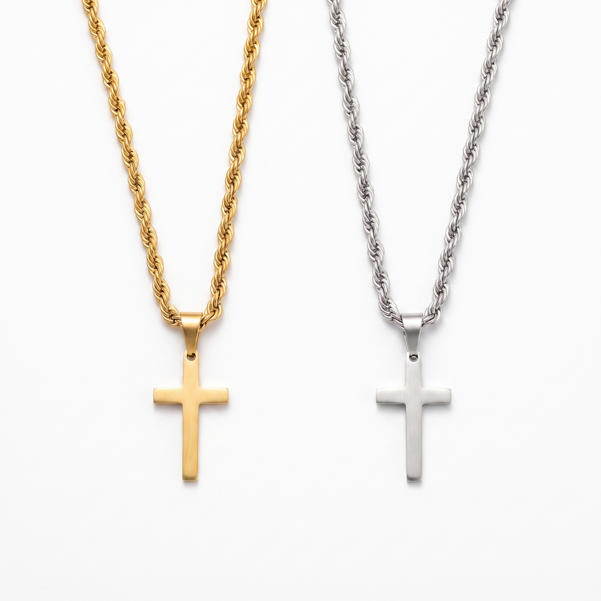 Minimalist cross necklace shown in gold and silver