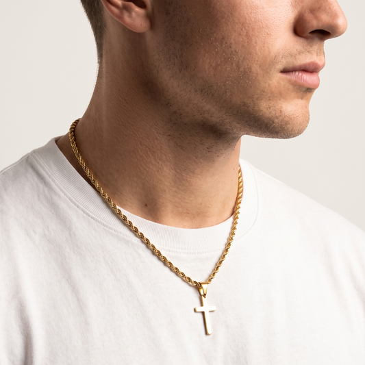Minimalist cross necklace worn, second angle