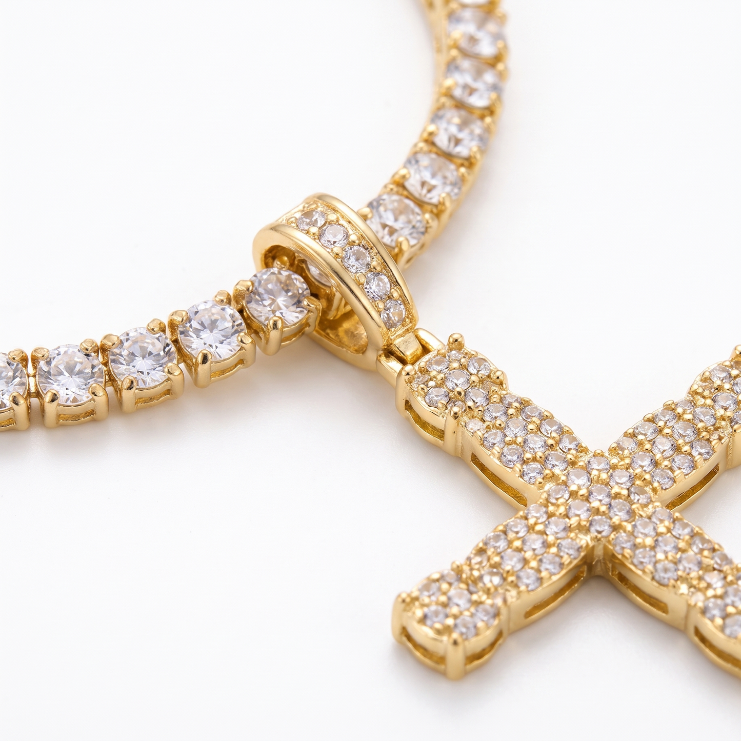 Close-up of pavé cross and tennis links