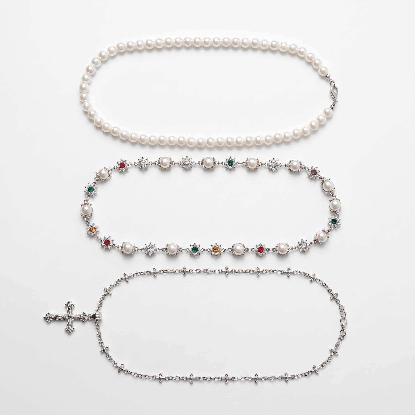 Cross set shown as all three necklaces