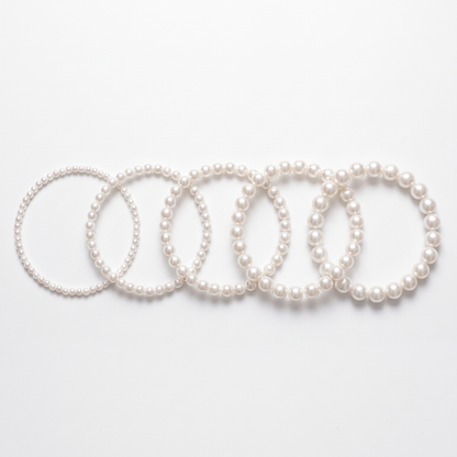 Pearl chokers shown in five bead sizes