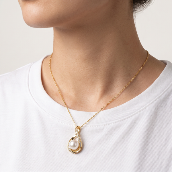 Pearl infinity moissanite necklace worn, second angle