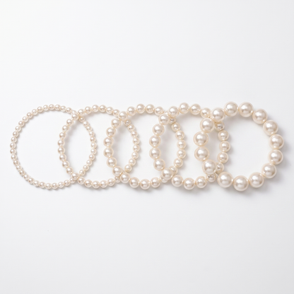 Pearl chokers shown in five bead sizes