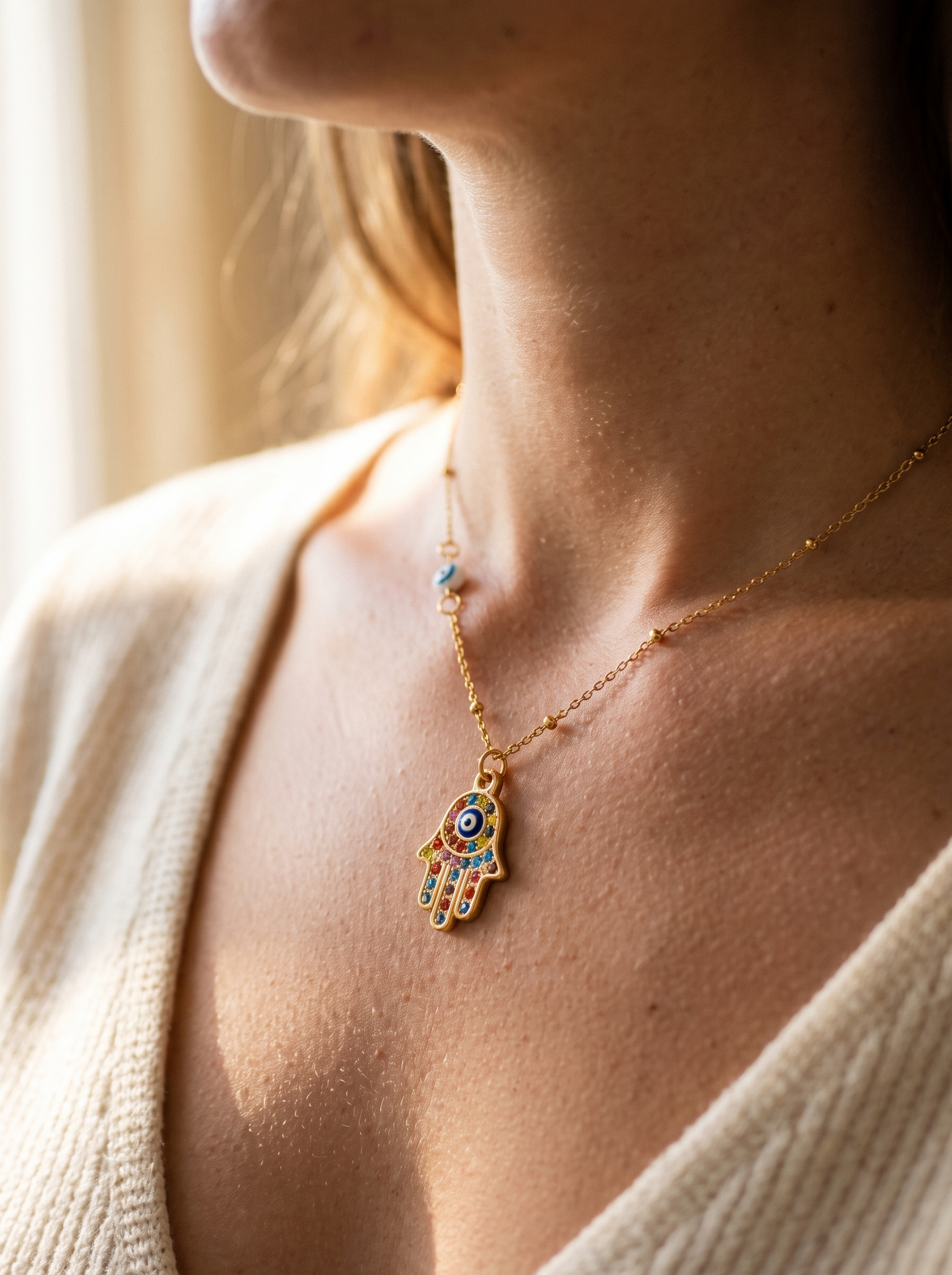 Aurelle hamsa evil eye necklace close detail