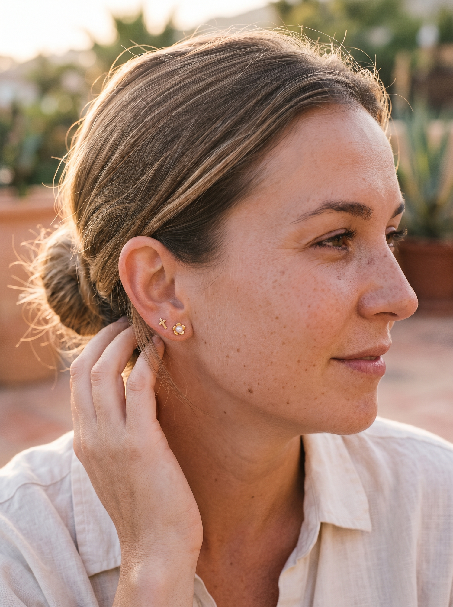 Aurelle pearl studs worn with hair up