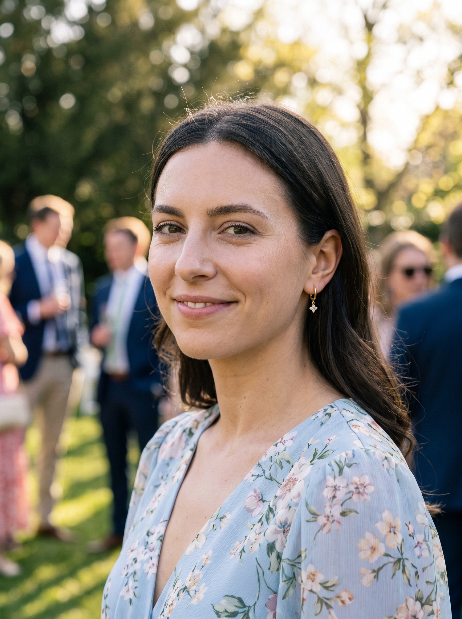 Aurelle flower drop earrings at a celebration